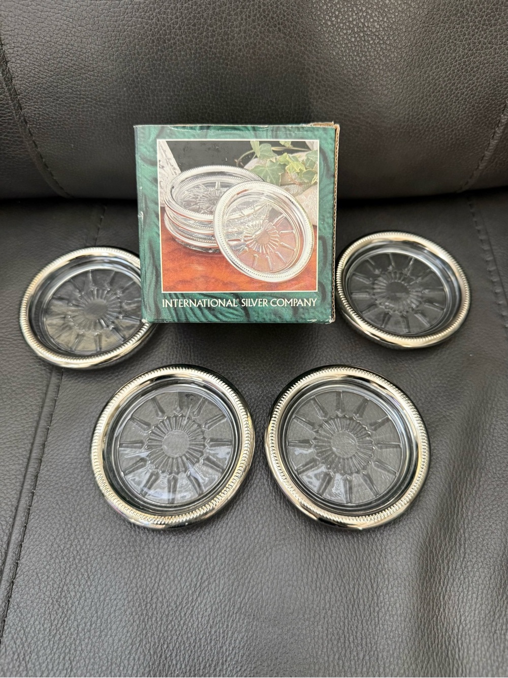 Set of 4 —International Silver Company coasters silver-plated metal and glass.